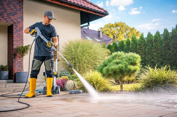Residential driveway being cleaned with a Kranzle pressure washer